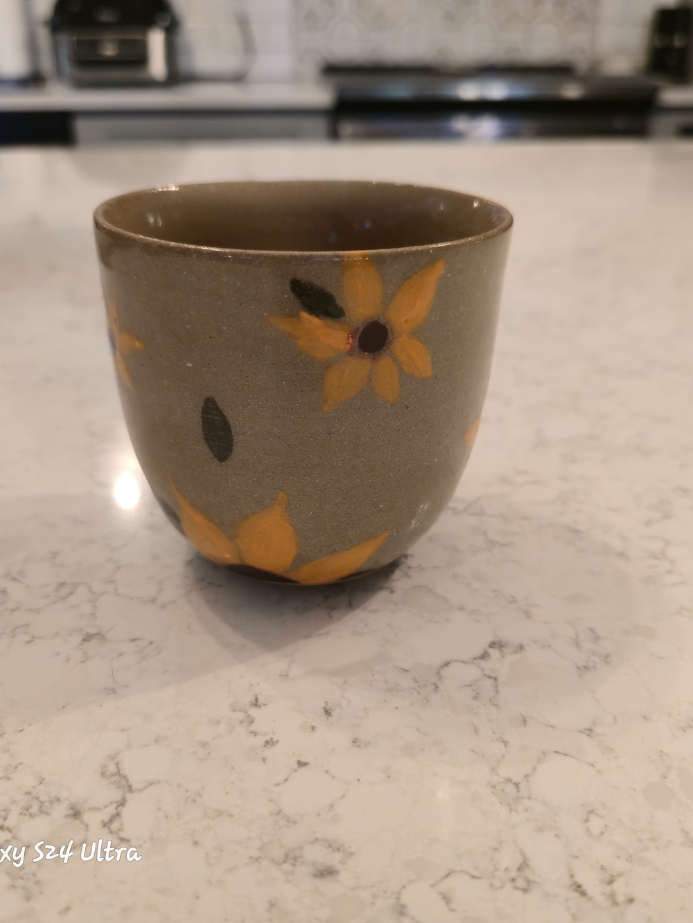 Tea Cup with Yellow Floral Print